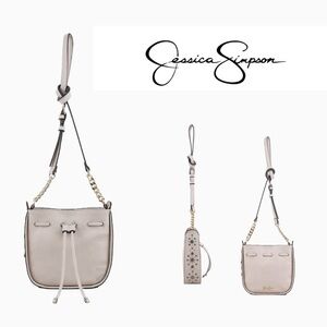 Jessica Simpson Elegant Sandstone Colored Drawstring calypso Crossbody Bag, NWT